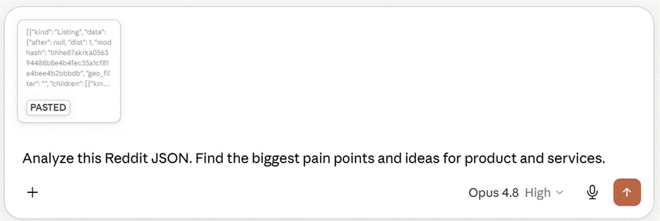 Screenshot of a Claude chat input box with pasted Reddit JSON data attached and the prompt: Analyze this Reddit JSON. Find the biggest pain points and ideas for product and services.